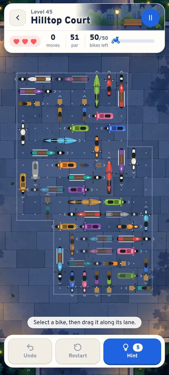 Level 45, Hilltop Court, in the night lot with 50 bikes